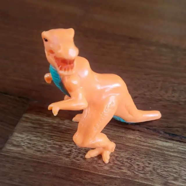 Tyrannosaurus Rex #145, Monster in My Pocket: Series 6: Secret Skeletal, Neon Orange