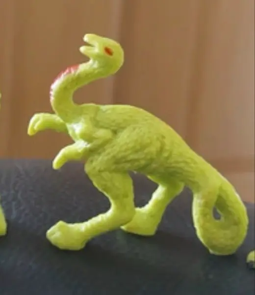 Struthiomimus #163, Monster in My Pocket: Series 6: Dinosaurs, Neon Yellow With Red